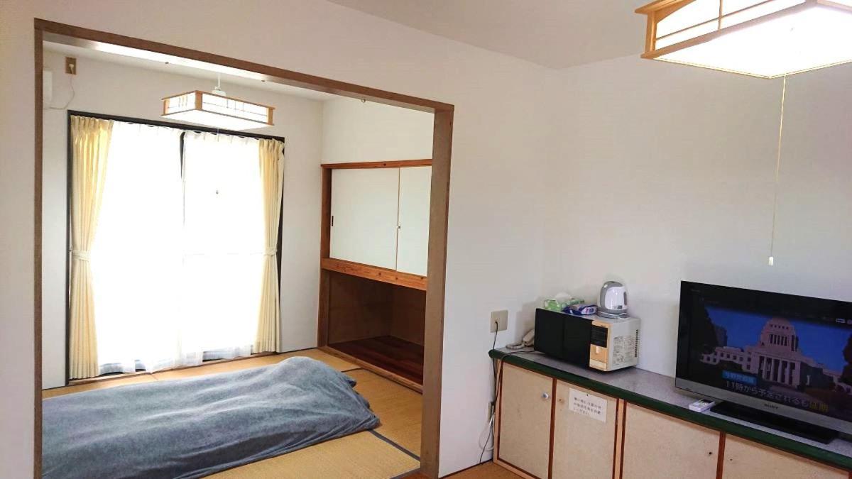 ไลแล็ก โฮเทล แอนด์ รีสอร์ต Hostel Kanoya ภายนอก รูปภาพ