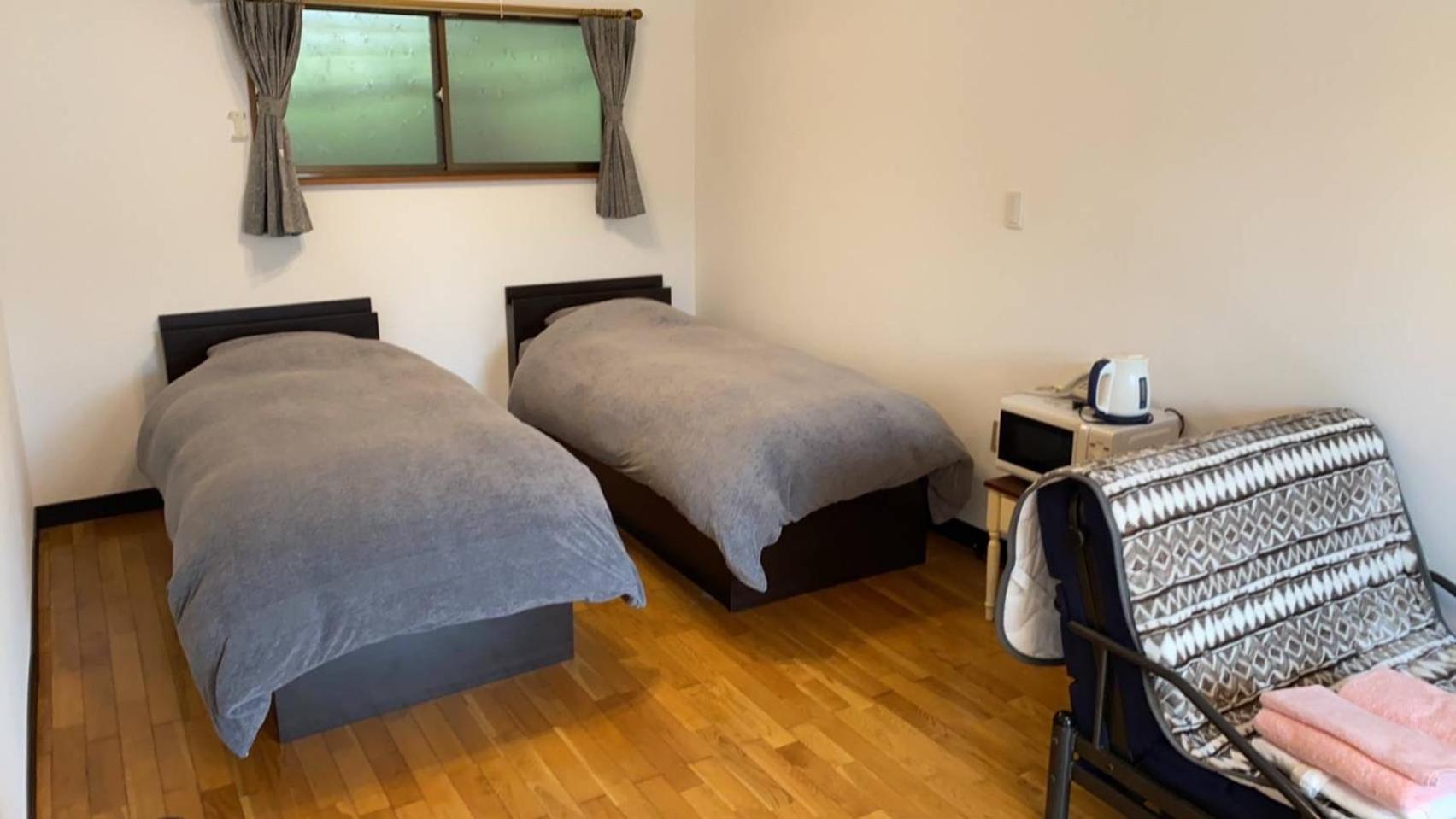 ไลแล็ก โฮเทล แอนด์ รีสอร์ต Hostel Kanoya ภายนอก รูปภาพ